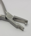 Orthodontic forceps for forming ligatures.