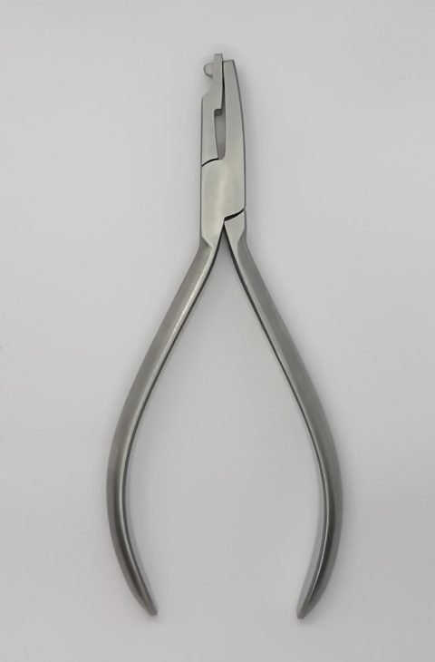 Orthodontic forceps for forming ligatures.