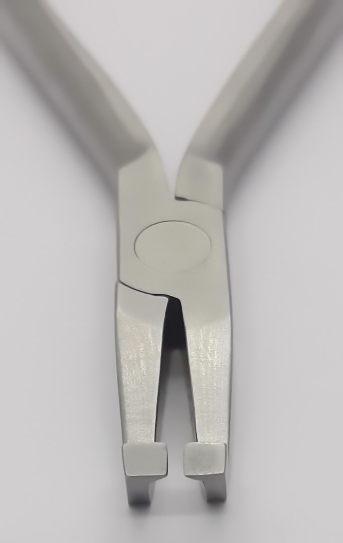 Orthodontic forceps for removing locks. Orthodontic forceps for removing locks.