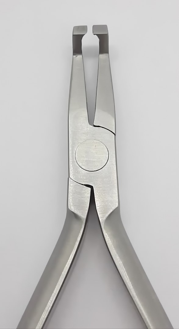 Orthodontic forceps for removing locks. Orthodontic forceps for removing locks.