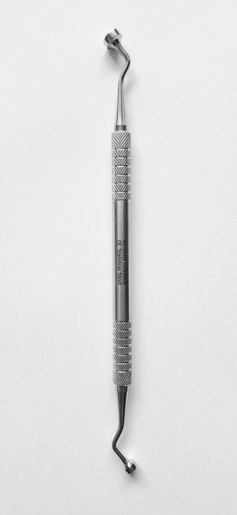 Przenośnik / upychadło do biomateriału